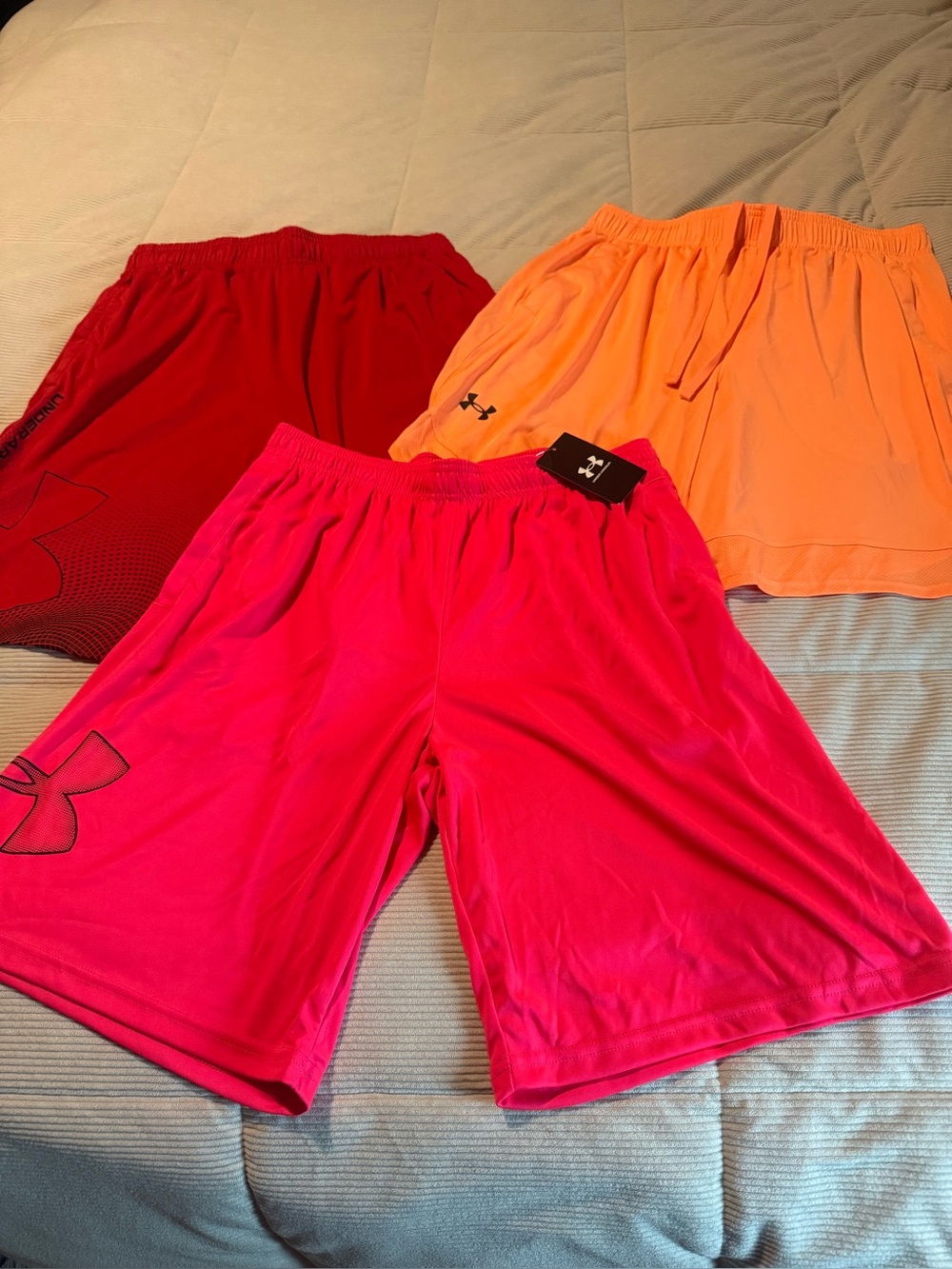 Under Armour Bright Pink, Red, and Orange Athletic Shorts Trio